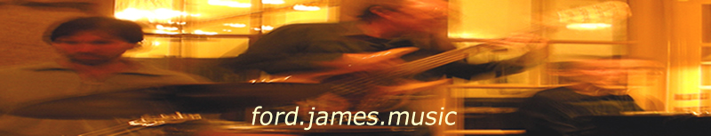 Artistically blurred photo of James Ford playing with his band.